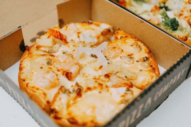 Pizza delivery - fresh hot pizza ready for delivery